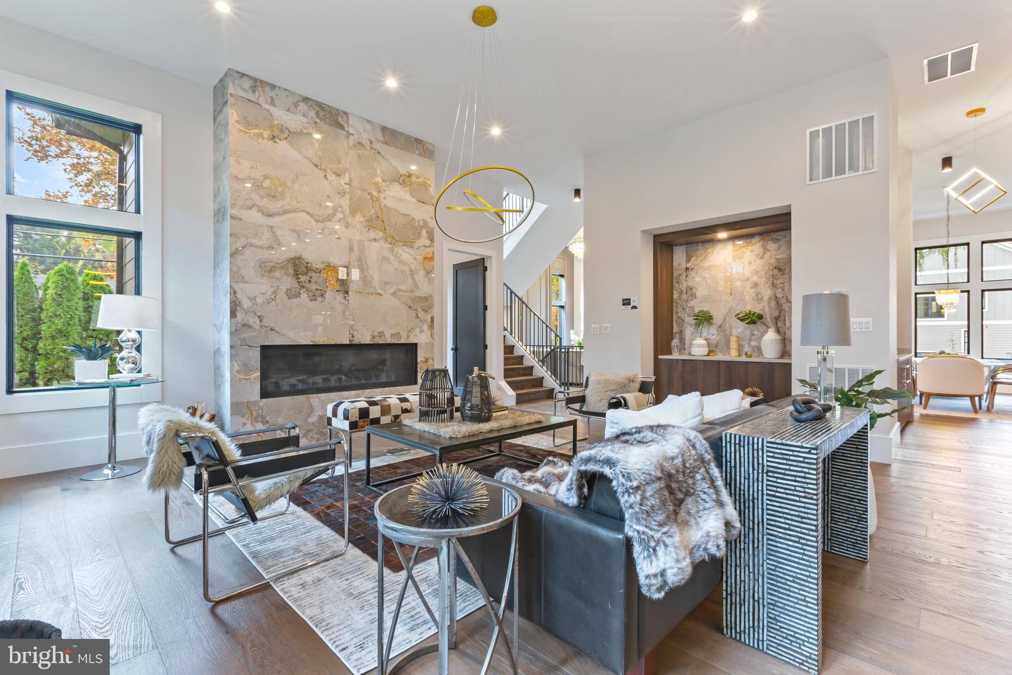 6160 Hardy Drive McLean, VA 22101 - Photo 8 of 41 a living room with fireplace furniture and a large window