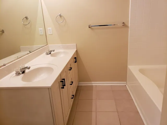 a bathroom with a sink and a tub