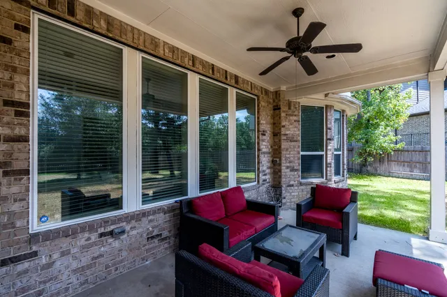 a outdoor living space with furniture and garden view