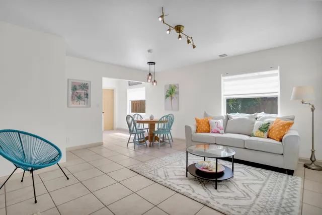 a room with furniture and a rug