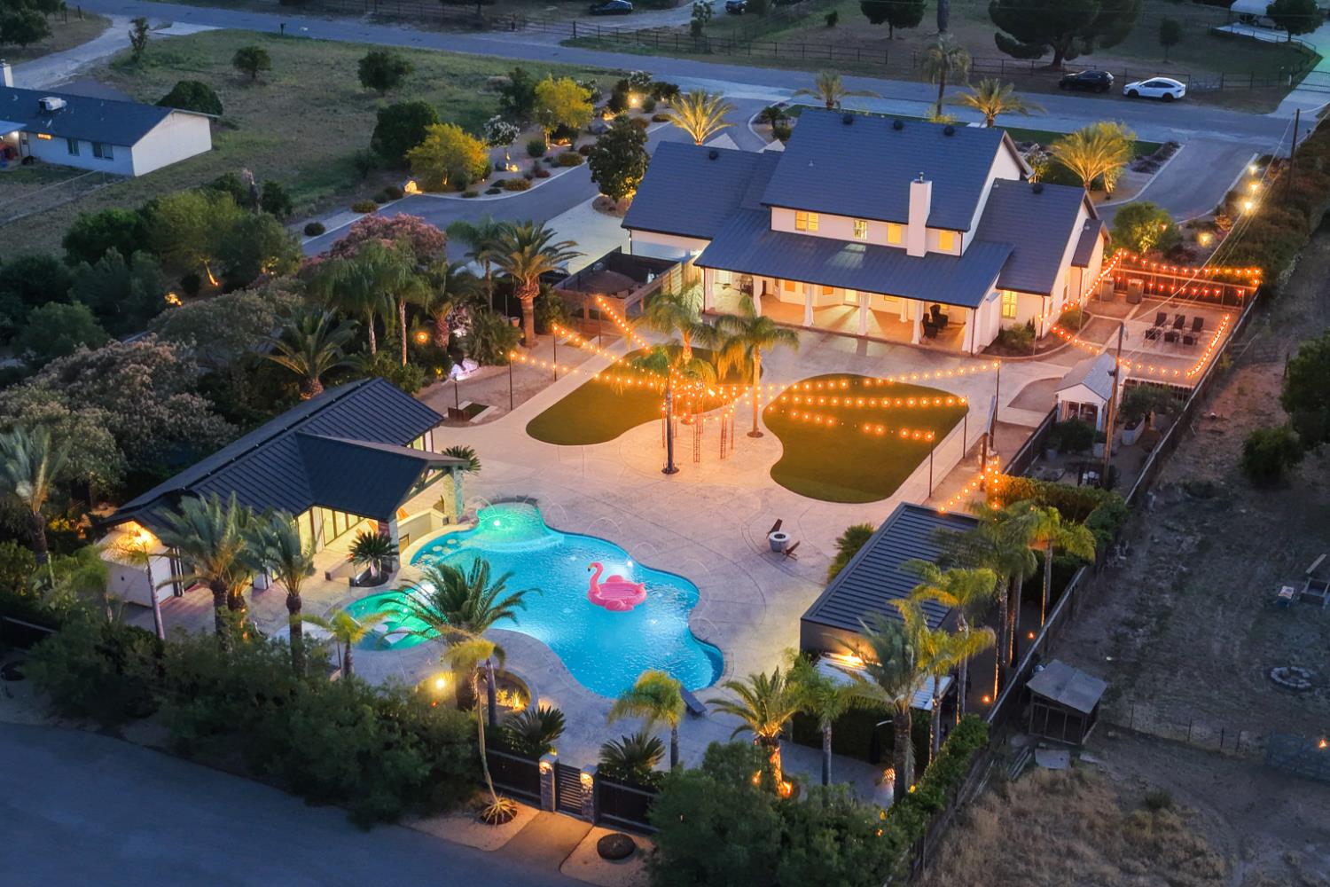 17113 Mark Road Madera, CA 93636 - Photo 6 of 99 an aerial view of a house with a yard and outdoor seating