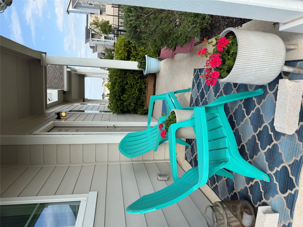 16710 Sonoma Breeze Drive Manor, TX 78653 - Photo 2 of 16 a view of a chairs and table in backyard