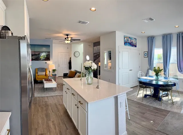 a very nice looking living room with a large window
