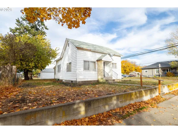 a view of swimming pool with a yard