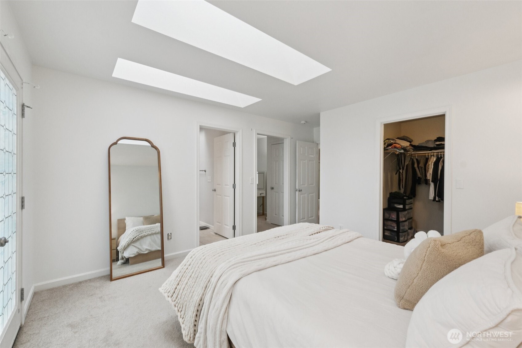 2750 Diamond Loop, Unit E Milton, WA 98354 - Photo 16 of 29 a bedroom with a bed and a mirror