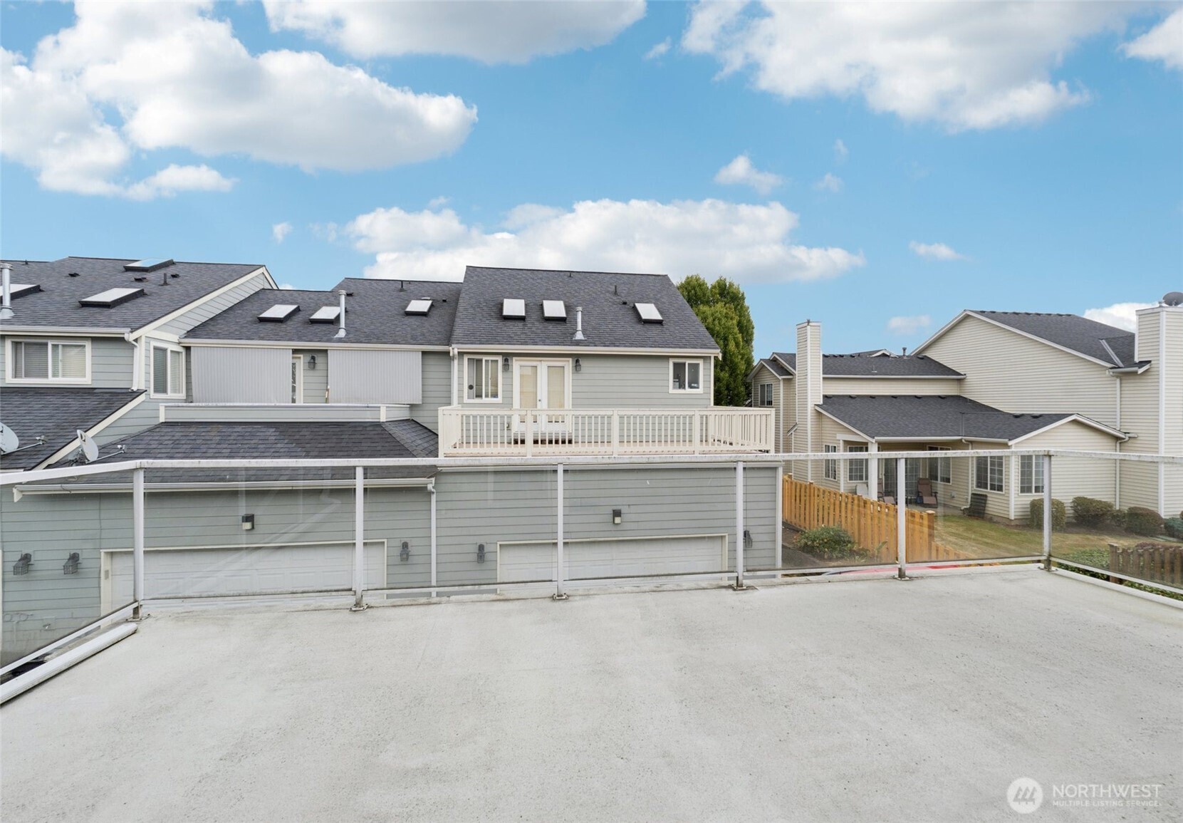 2750 Diamond Loop, Unit E Milton, WA 98354 - Photo 24 of 29 an aerial view of a house with a parking space
