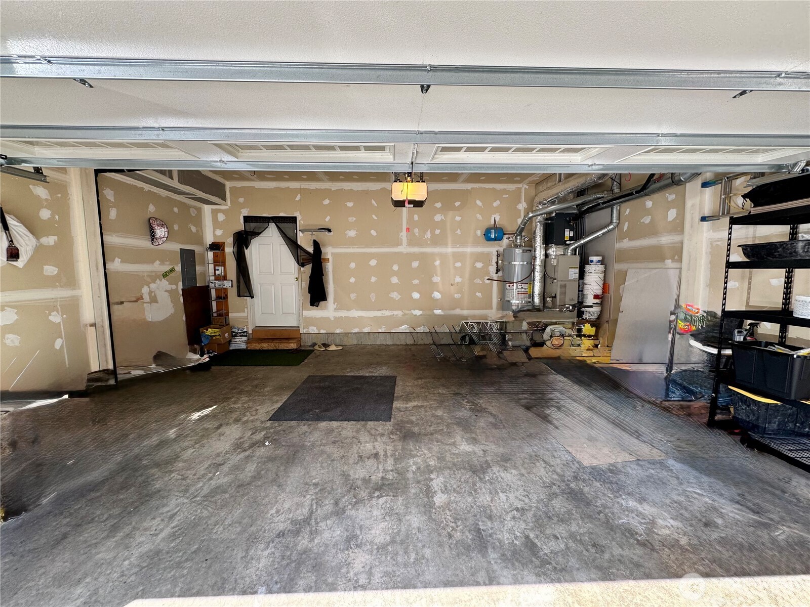 2750 Diamond Loop, Unit E Milton, WA 98354 - Photo 28 of 29 a view of parking garage with gym equipment