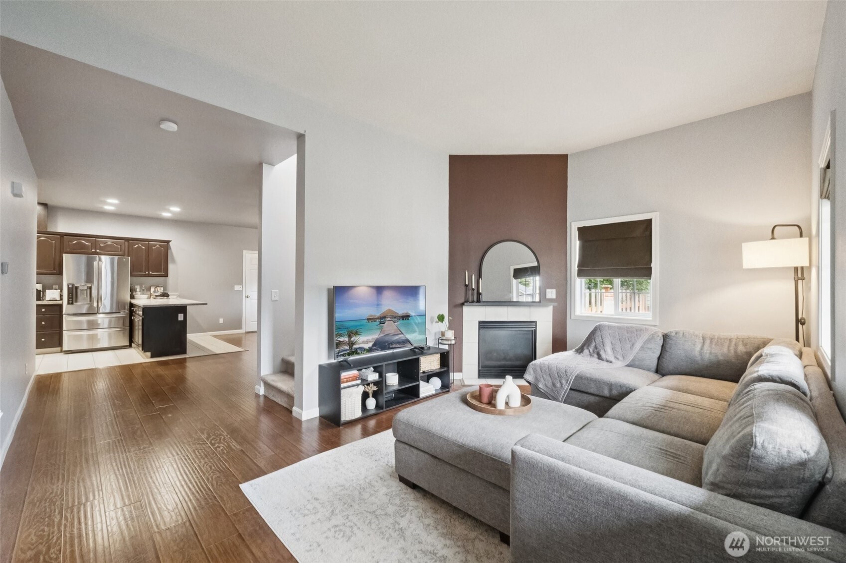 2750 Diamond Loop, Unit E Milton, WA 98354 - Photo 6 of 29 a living room with furniture and a wooden floor