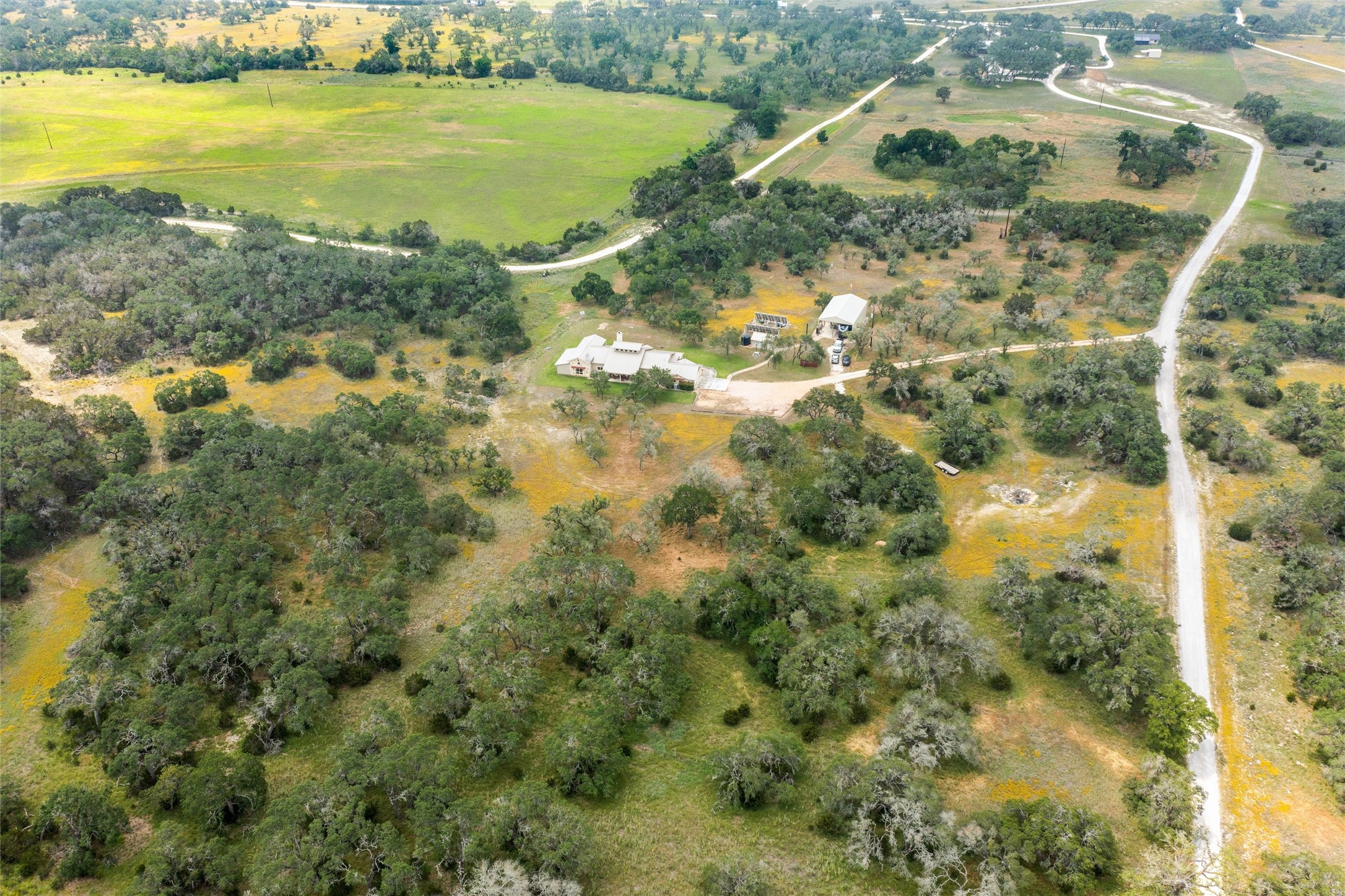 426 Preiss Ranch Road Blanco, TX 78606 - Photo 37 of 40 a view of a lake with a yard