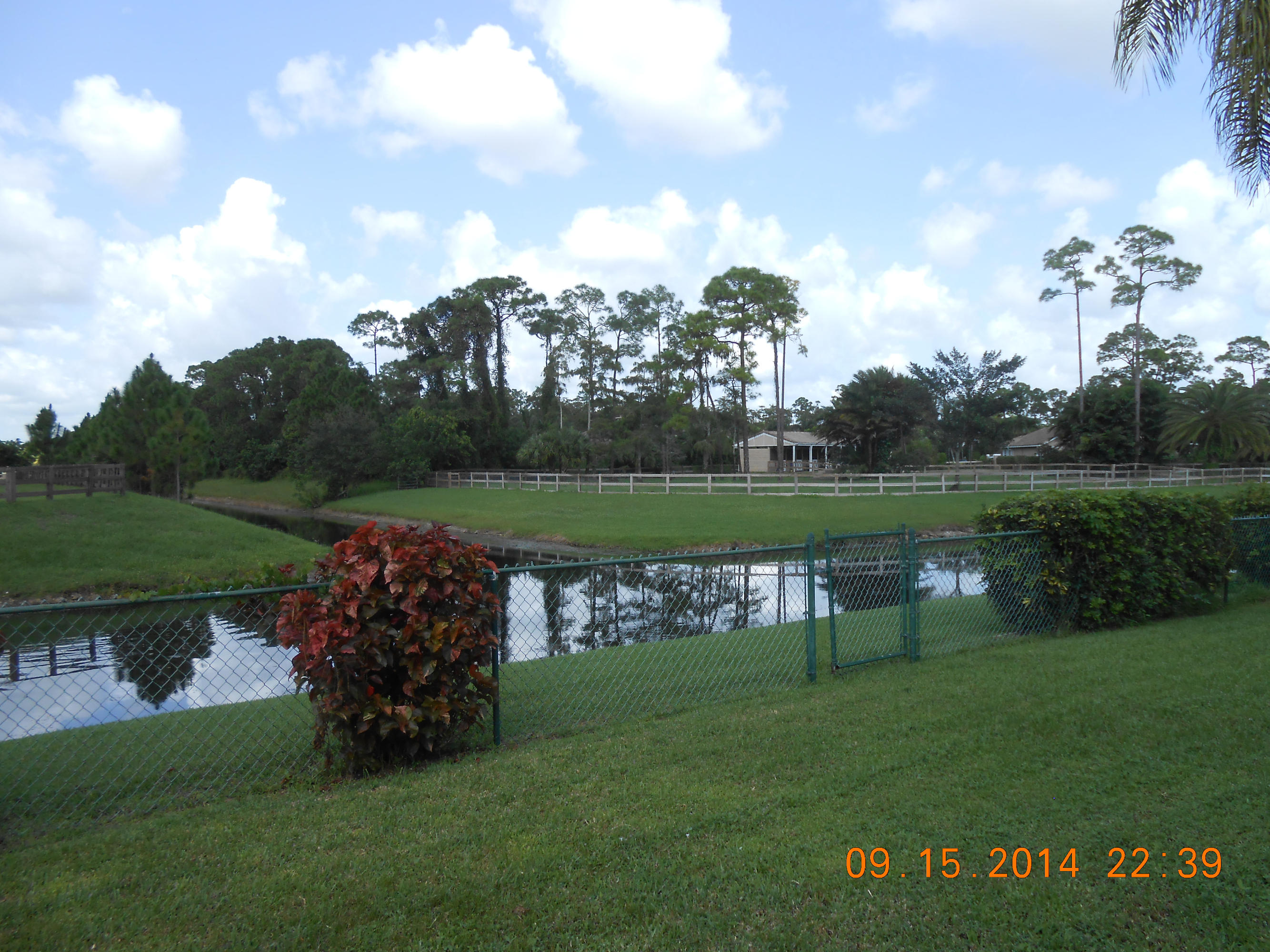1192 Raintree Lane Wellington, FL 33414 - Photo 4 of 5 Backyard