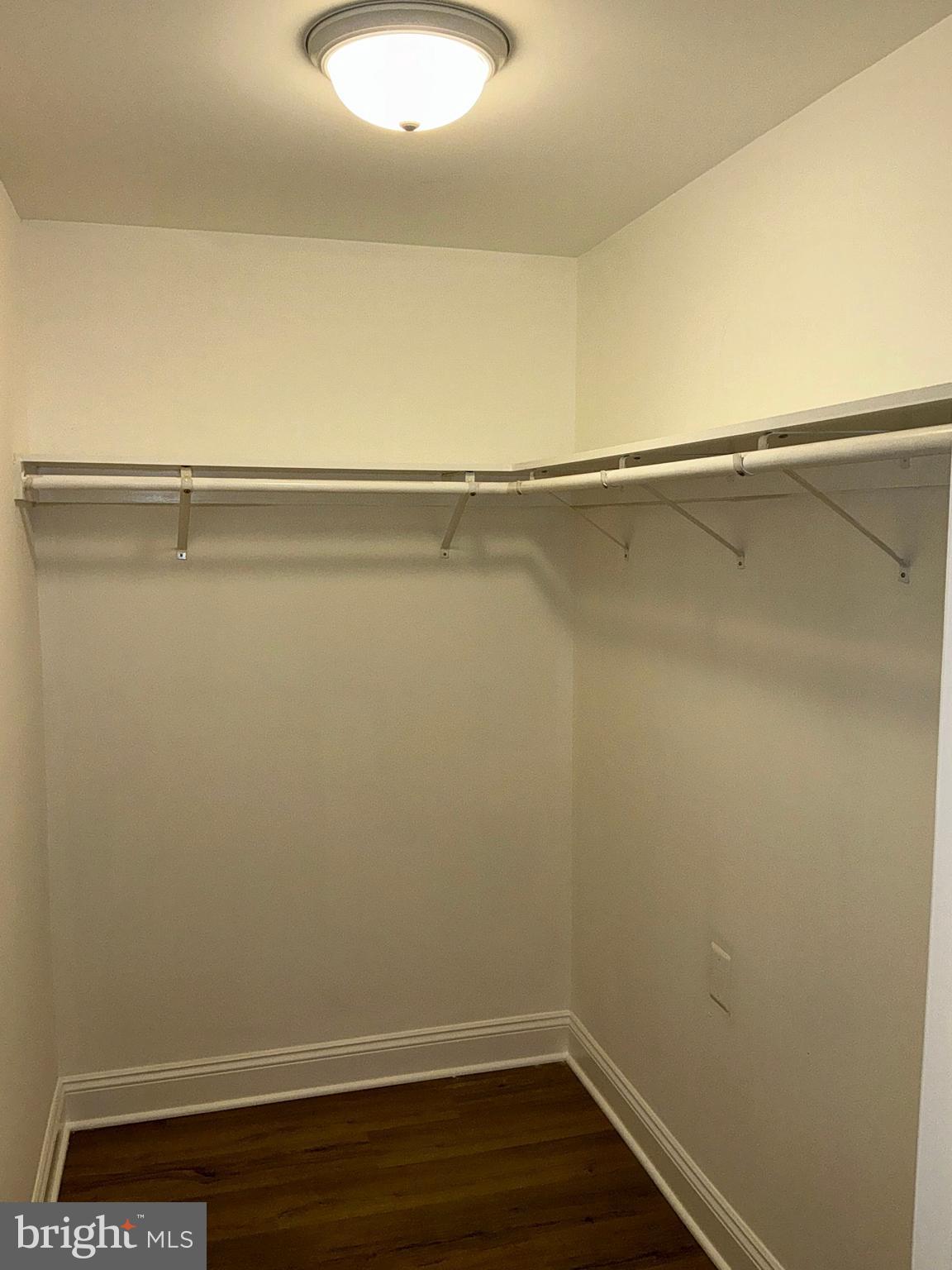 10003 Vanderbilt Circle, Unit 11 Rockville, MD 20850 - Photo 13 of 23 a view of a room with wooden floor