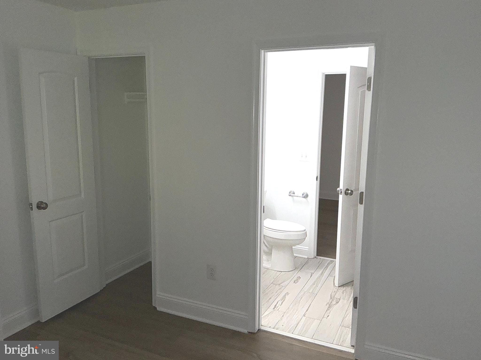 10003 Vanderbilt Circle, Unit 11 Rockville, MD 20850 - Photo 18 of 23 a bathroom with a toilet