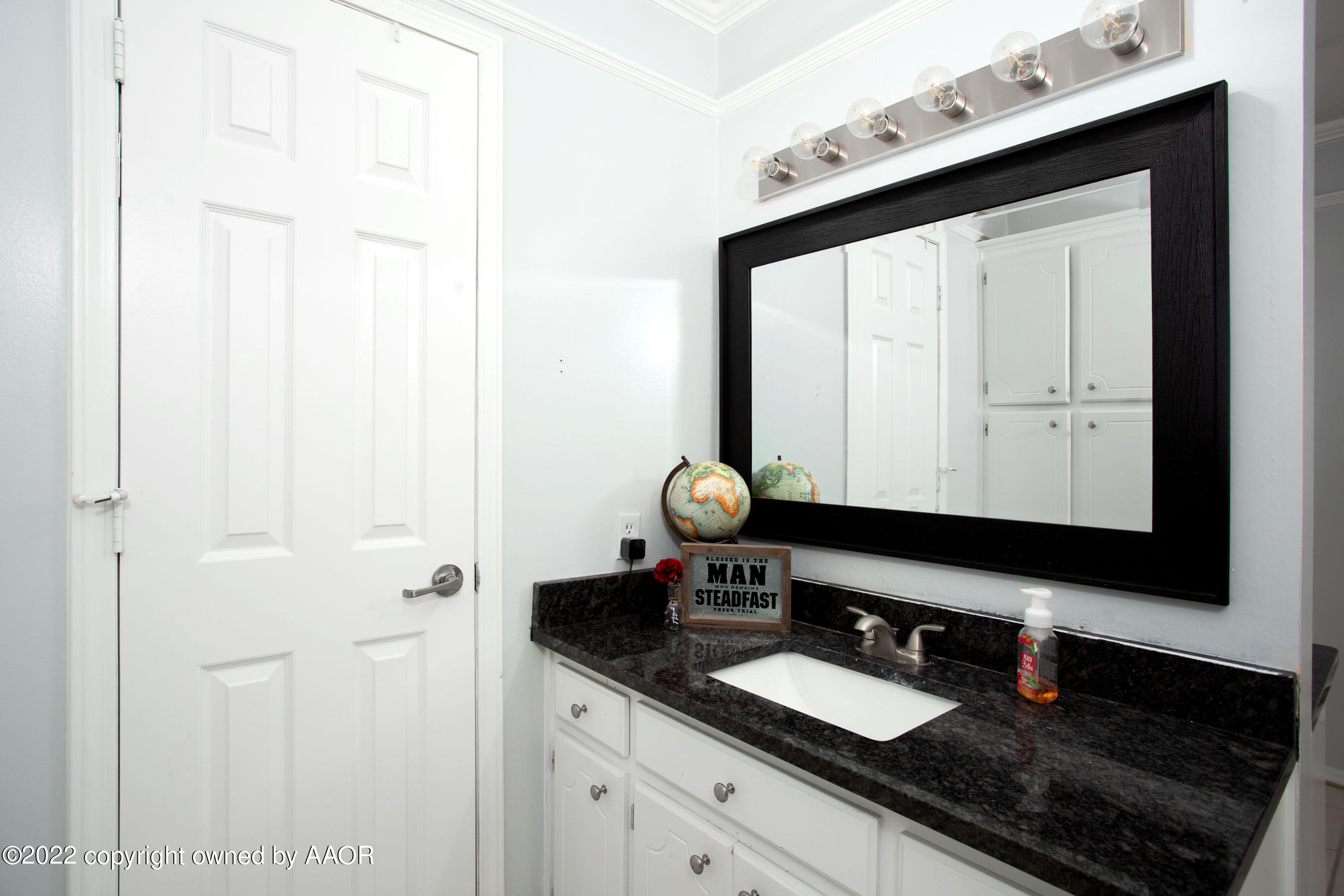 7009 Old Kent Road Amarillo, TX 79109 - Photo 19 of 30 "His" vanity & walk in closet
