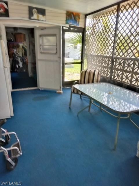 519 Riviera Boulevard East Naples, FL 34112 - Photo 12 of 23 View of sunroom