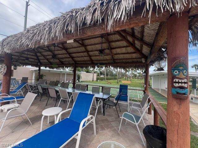 519 Riviera Boulevard East Naples, FL 34112 - Photo 19 of 23 View of patio featuring a gazebo and a ceiling fan