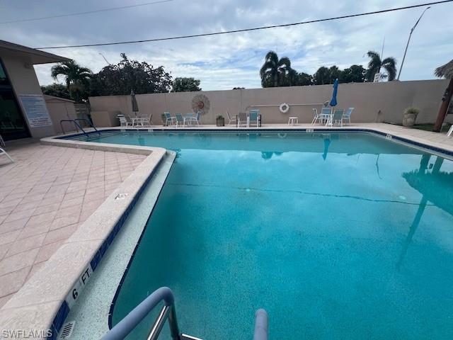 519 Riviera Boulevard East Naples, FL 34112 - Photo 22 of 23 Community pool with a patio