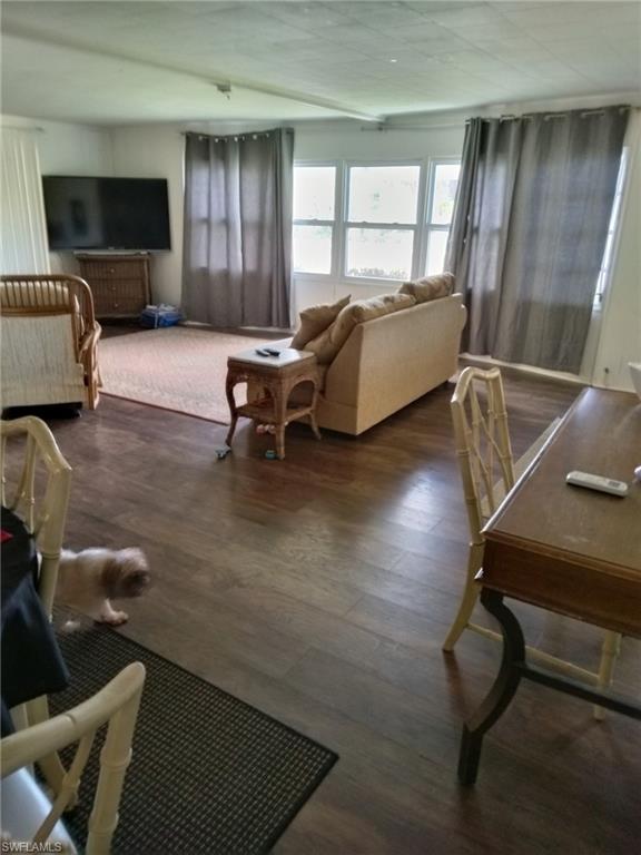 519 Riviera Boulevard East Naples, FL 34112 - Photo 4 of 23 Living room with wood finished floors
