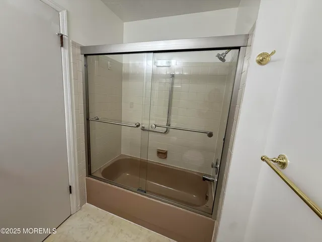 a bathroom with a bathtub