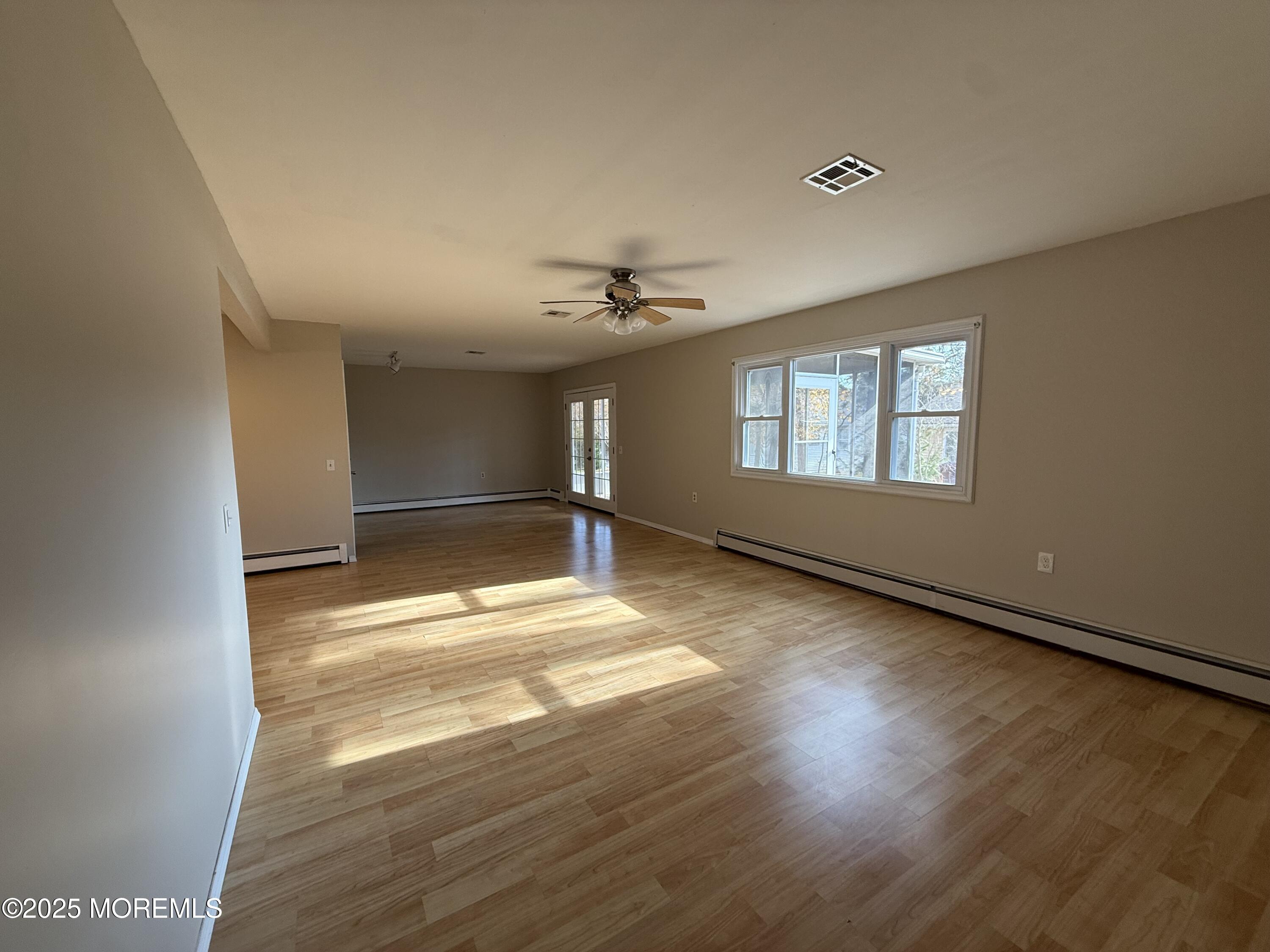 68 Virgin Islands Drive Toms River, NJ 08757 - Photo 6 of 19 a view of an empty room with a window