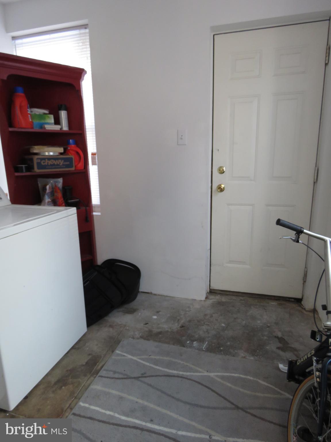 519 North 35th Street Philadelphia, PA 19104 - Photo 6 of 8 a bedroom with a bed and cabinets