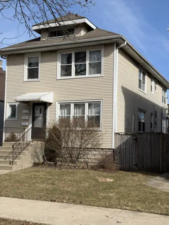 a front view of a house with a porch