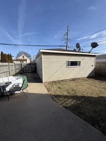 a front view of a house with parking