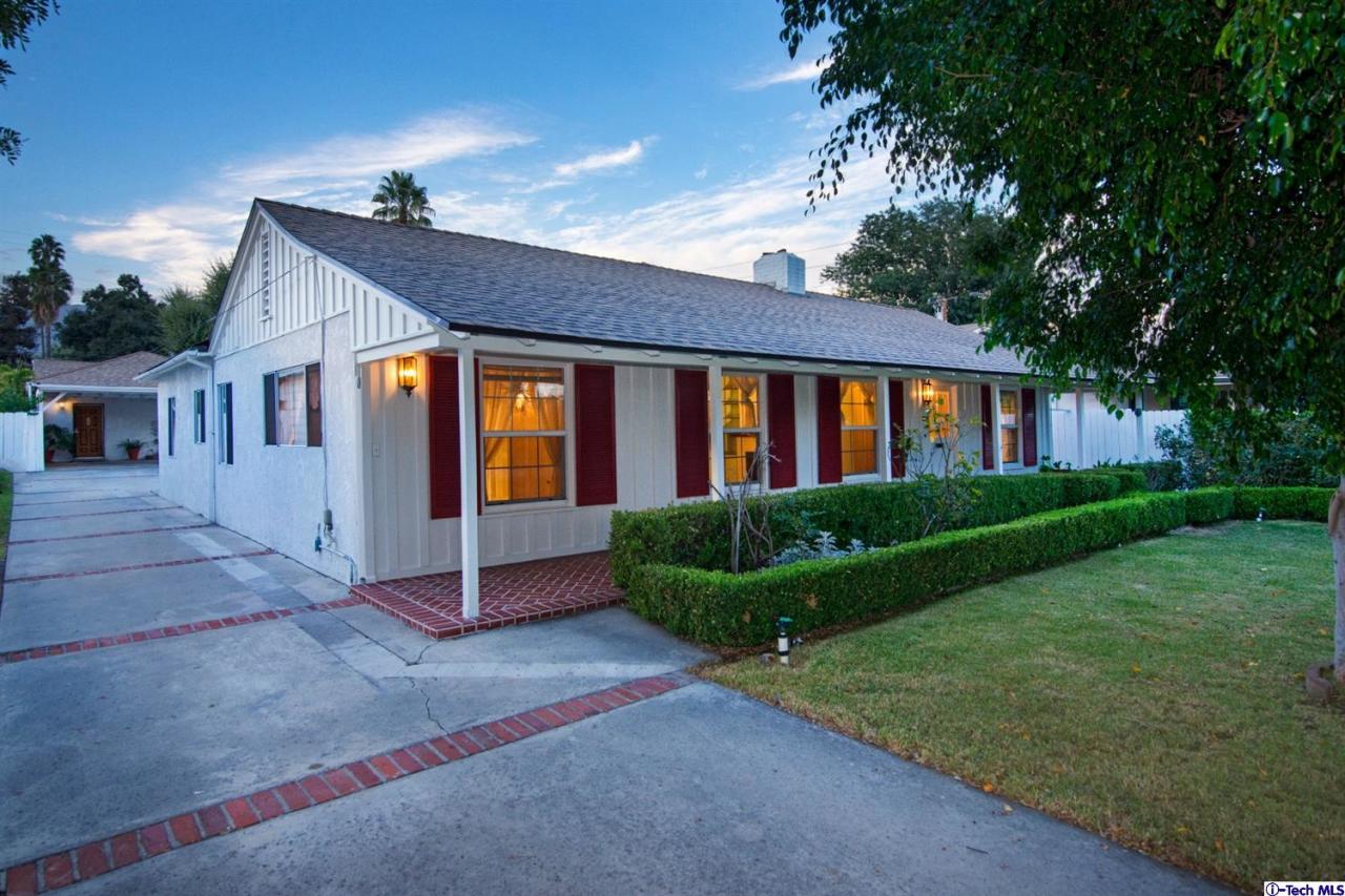 3263 Orlando Road Pasadena, CA 91107 - Photo 2 of 56 a front view of a house with a yard