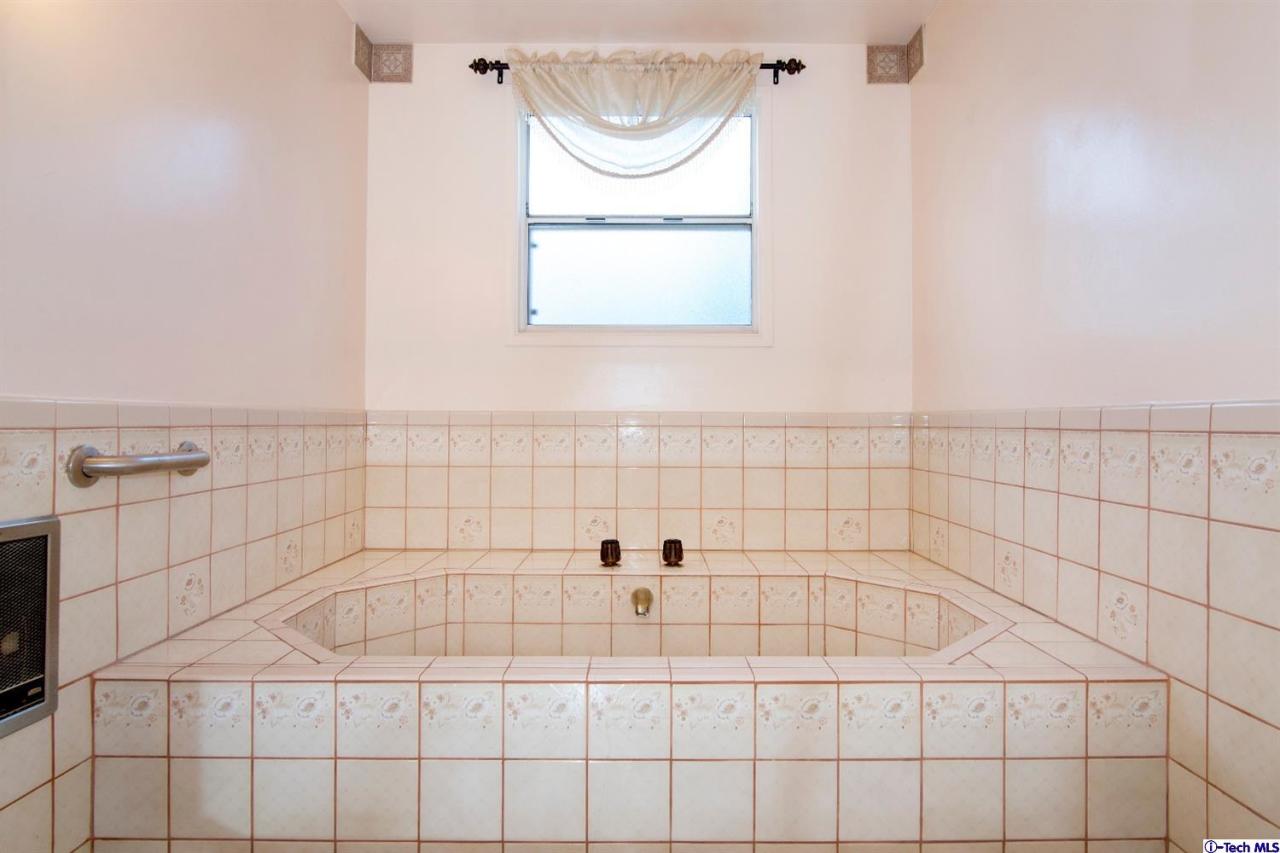 3263 Orlando Road Pasadena, CA 91107 - Photo 37 of 56 a bathroom with a bathtub and a shower