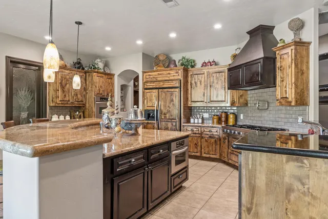 a bathroom with a sink toilet vanity and bathtub