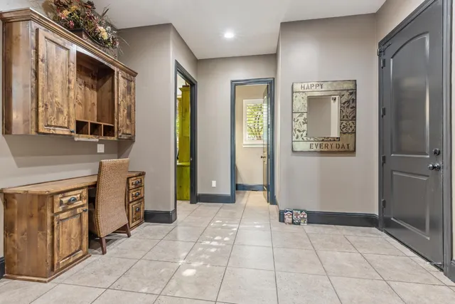 a kitchen with stainless steel appliances a sink stove and microwave