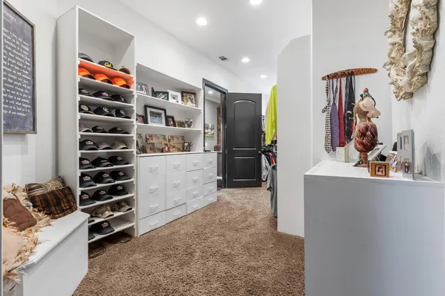 a view of an outdoor dining space with furniture window and outside view