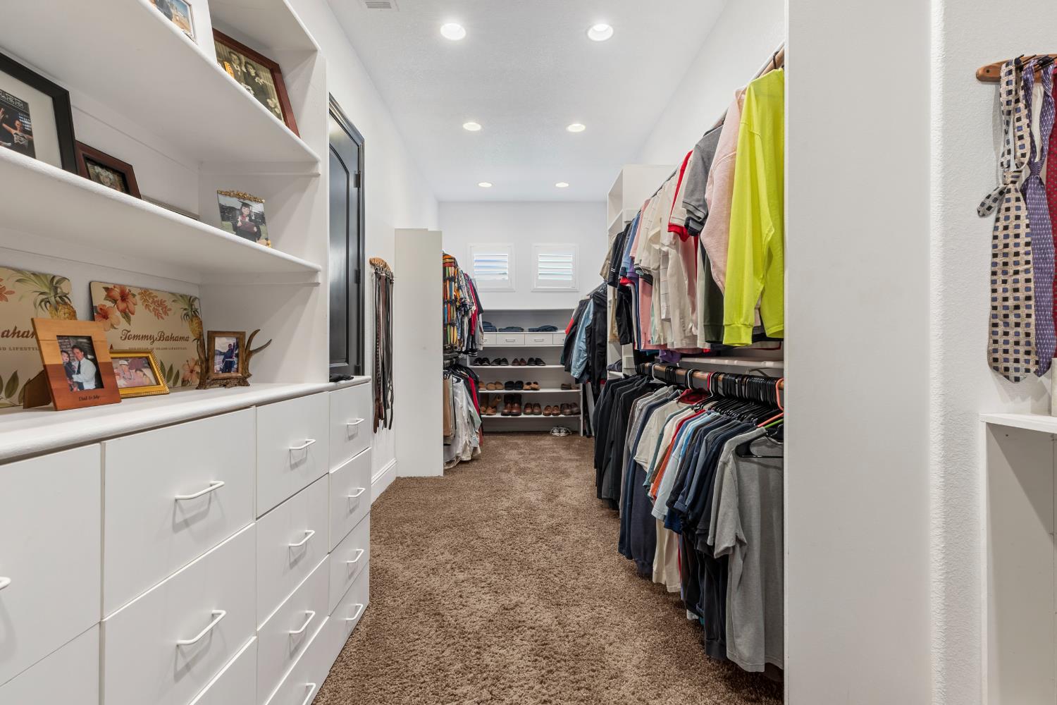 29533 Chapman Way Escalon, CA 95320 - Photo 42 of 99 a view of walk in closet with clothes and shoes