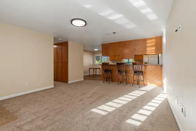 an aerial view of house with yard