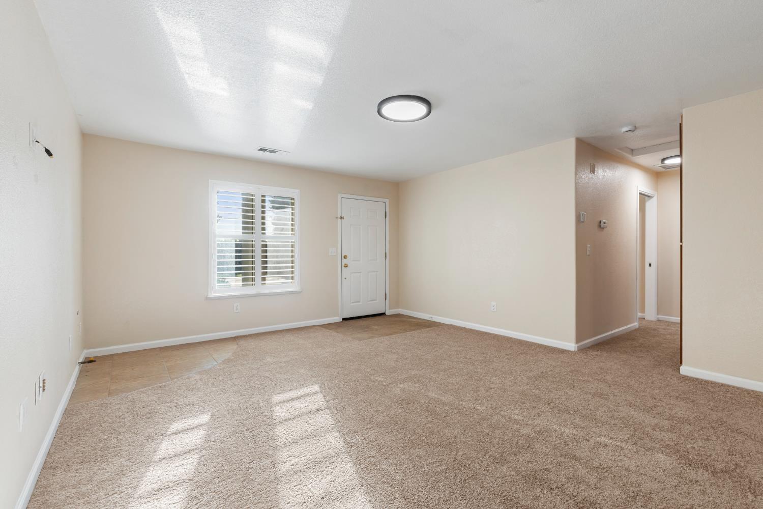 29533 Chapman Way Escalon, CA 95320 - Photo 50 of 99 an empty room with windows