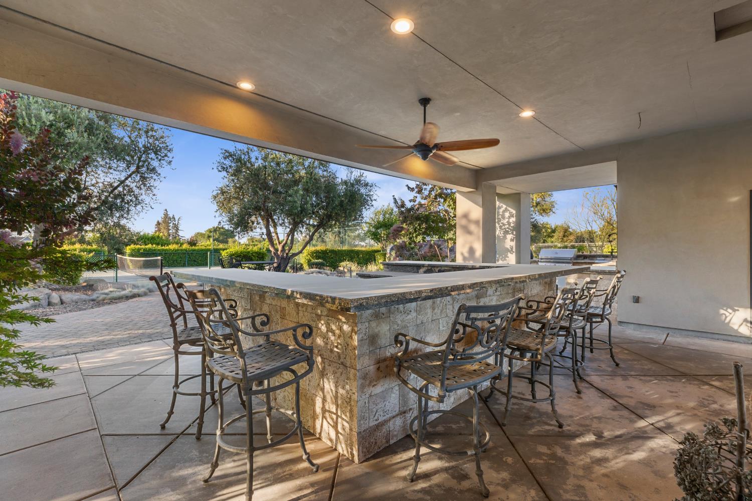 29533 Chapman Way Escalon, CA 95320 - Photo 83 of 99 a view of a dining room with furniture and a floor to ceiling window