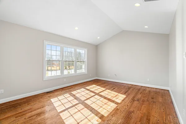 a view of livingroom with hardwood floor and window