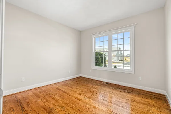 a view of a balcony with city view