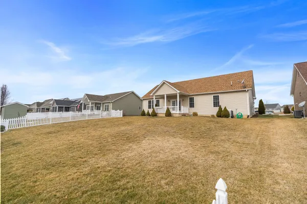 an aerial view of residential building with ocean view