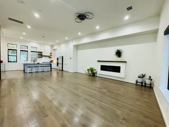 a view of kitchen with furniture and natural light