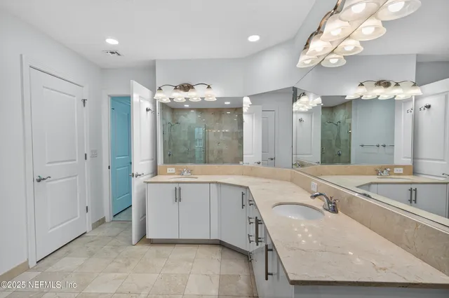 a bathroom with a shower and a bathtub