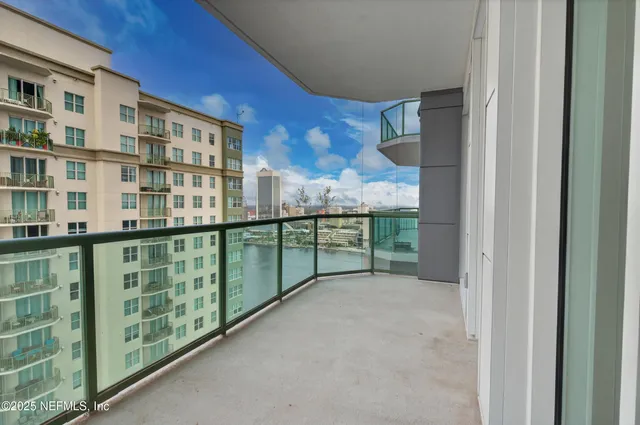 a view of a balcony with an outdoor space