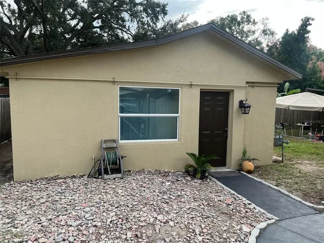 a house view with a outdoor space