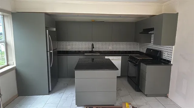 a utility room with washer and dryer