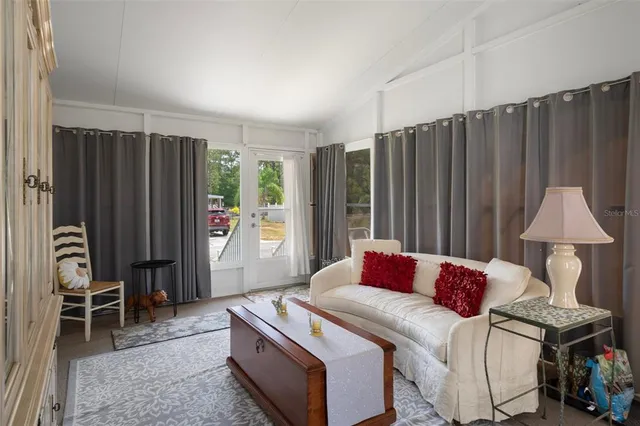 a view of a garage with parked cars