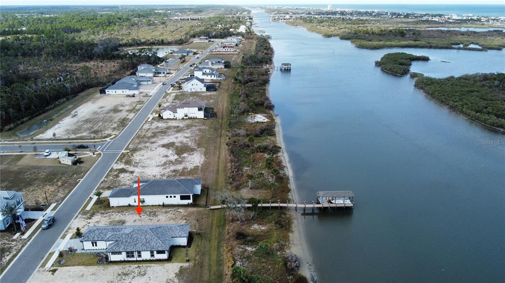 84 Coronado Road Flagler Beach, FL 32136 - Photo 4 of 15 an aerial view of residential houses with outdoor space