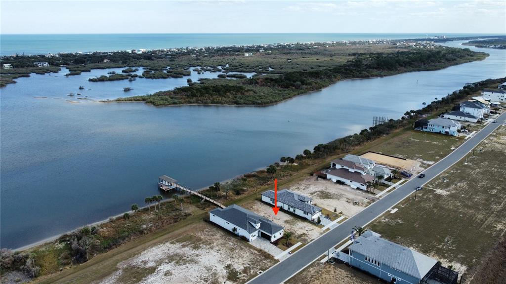 84 Coronado Road Flagler Beach, FL 32136 - Photo 6 of 15 an aerial view of a city