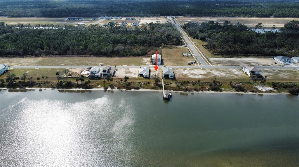 84 Coronado Road Flagler Beach, FL 32136 - Photo 7 of 15 a view of a lake with a mountain