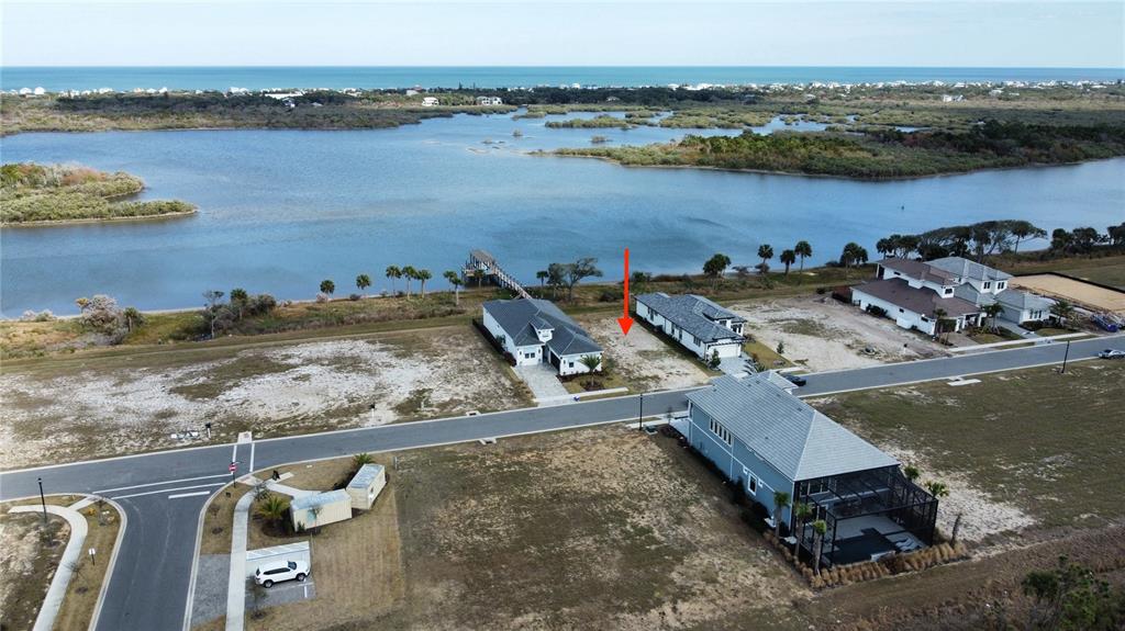 84 Coronado Road Flagler Beach, FL 32136 - Photo 10 of 15 an aerial view of a house with a lake view