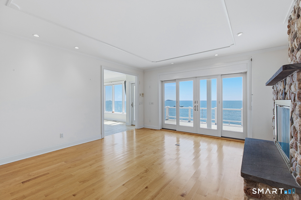 Sliders to deck and adjacent sunroom