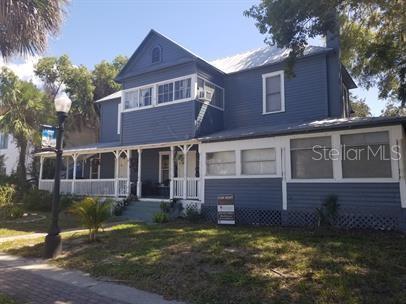 318 East Tarpon Avenue, Unit 5 Tarpon Springs, FL 34689 - Photo 1 of 16 a view of a house with a yard
